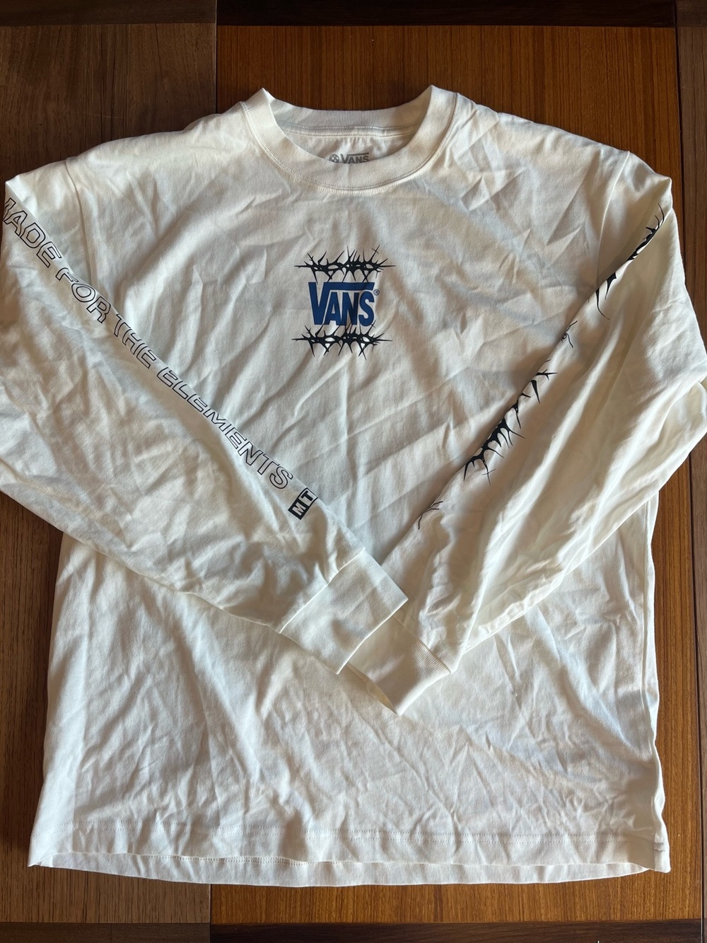 Vans White Long Sleeve Tee with Blue Logo and Black Graphics